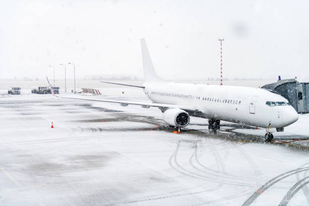 istock Airplane & airport & snow 974738784