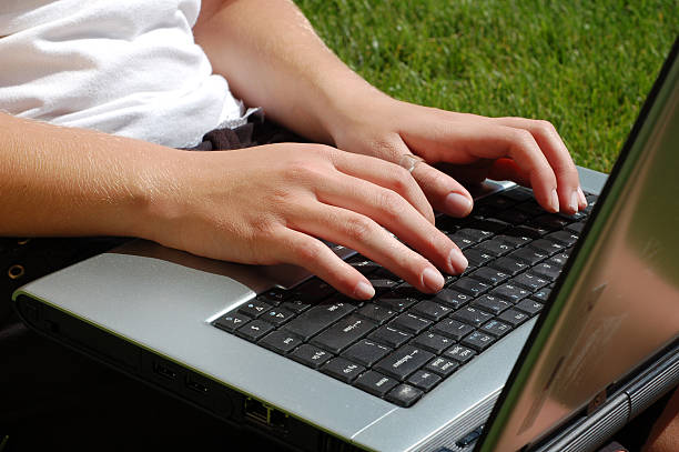 istock Laptop in the Lawn 97474103