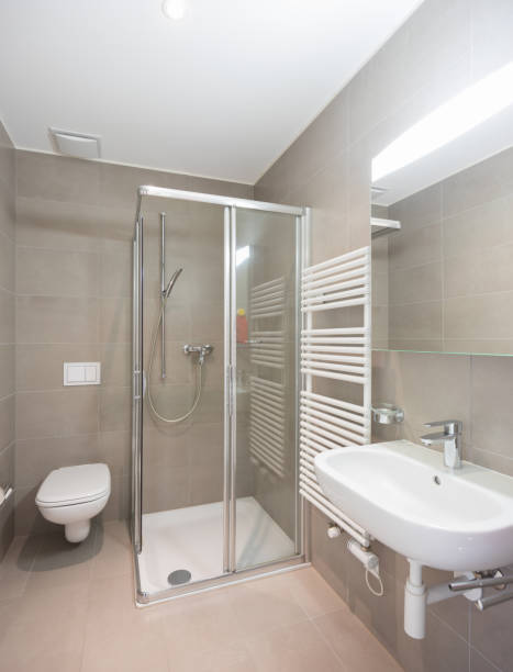 istock Bathroom with large modern tiles 974743022
