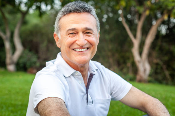istock Happy mature male man smiling 974745492