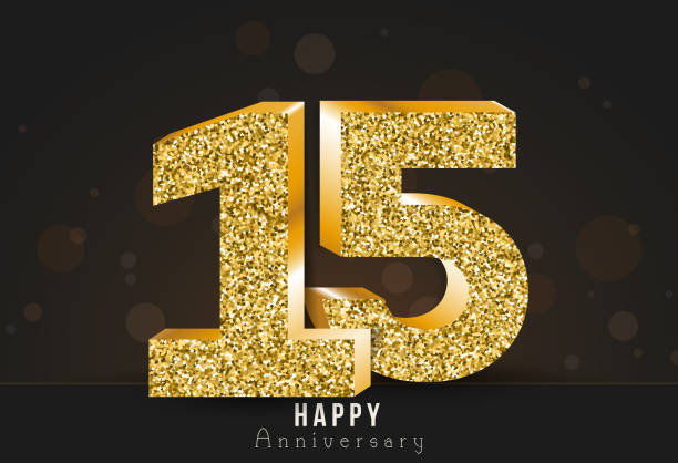 istock 15 - year happy anniversary banner. 15th anniversary gold logo on dark background. 974745882
