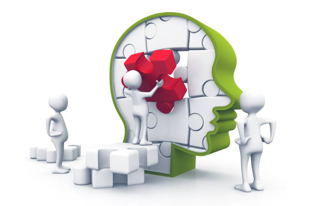 istock Business teamwork building puzzles together 974746460
