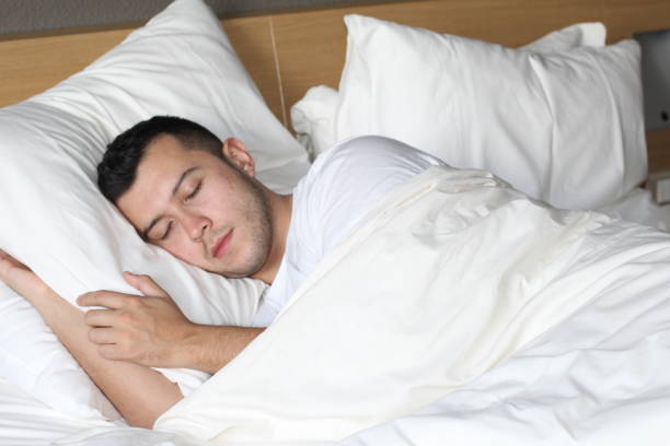 istock Relaxed ethnic male sleeping like a baby 974746618