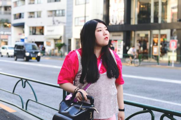 istock Young traveler in pink 974749648