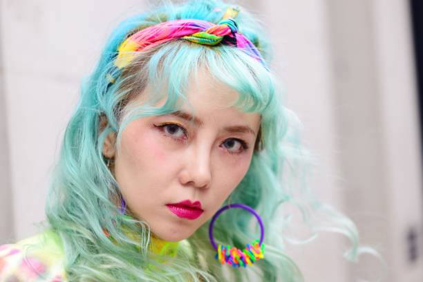 istock Colourful young woman 974750072