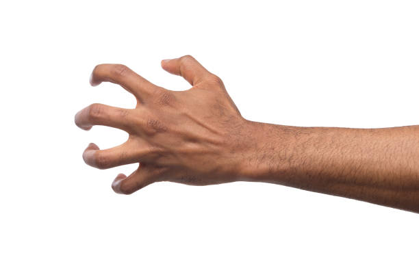 istock Black male hand picking up something, cutout 974755214