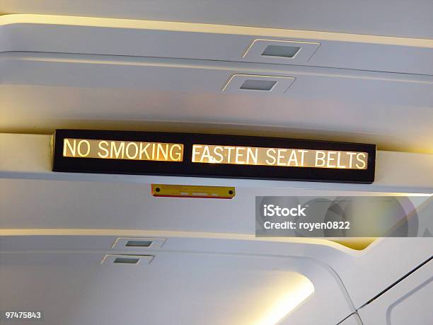 Airplane Sign No Smokingfasten Seat Belts Stock Photo - Download Image Now - Adrián Fernández - Race Car Driver, Air Vehicle, Aircraft Canopy