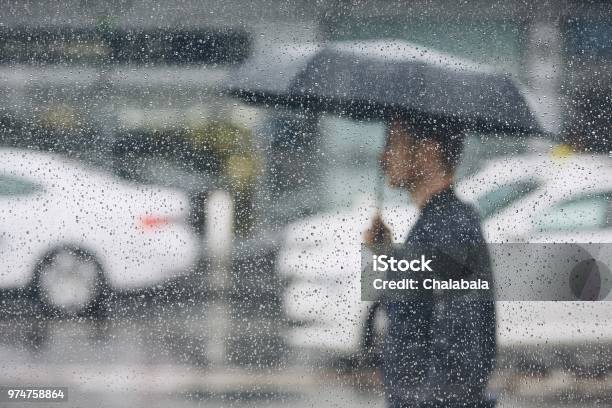 Rain In City Stock Photo - Download Image Now - Rain, People, Umbrella