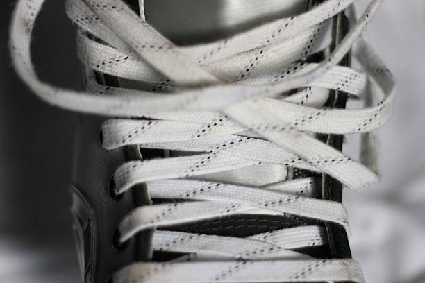 Hockey skate: unlaced, front close-up.
