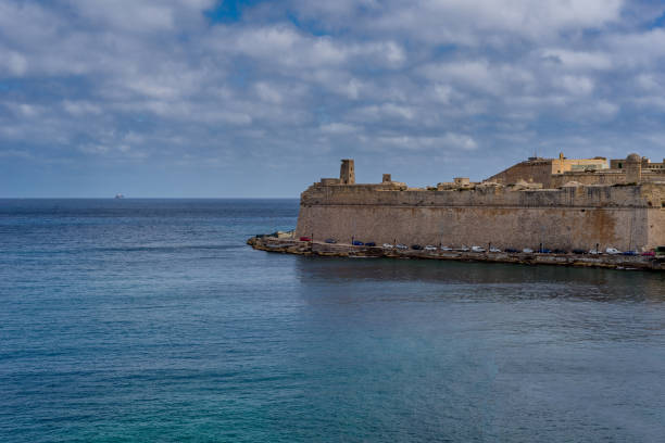 istock Mediterranean Sea, view from Valletta, Malta. Blue cloudy sky as background. 974761994