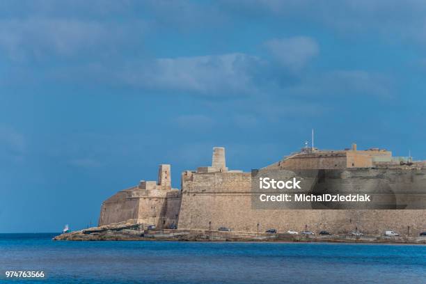 Valletta Malta Skyline Od Capitol City With Blue Cloudy Sky As Background Stock Photo - Download Image Now