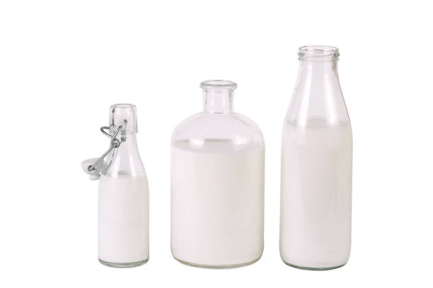istock three different bottles of milk isolated on white background 974771044