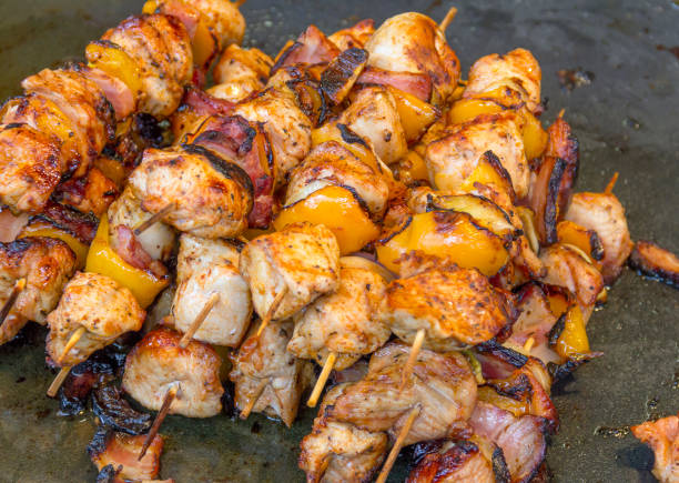 istock barbecued meat skewers 974771524