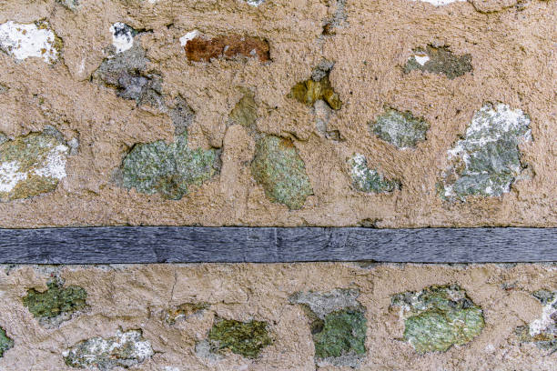 The ancient stone walls of the monastery wall with the inclusion of the wooden beams in the old Greek monastery of the Great Meteora.
