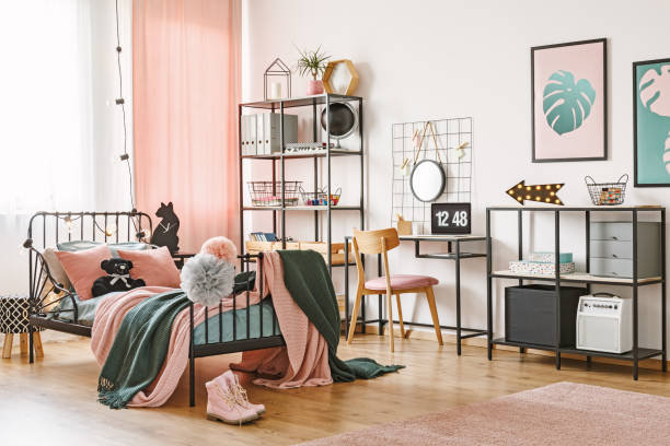 istock Pink and green feminish bedroom 974784824