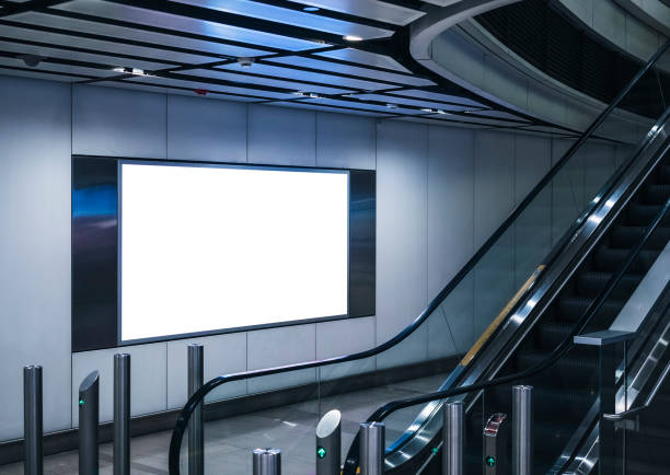istock Blank Billboard Banner Poster Light boxBlank Banner Light box media indoor building escalator in subway station 974785570