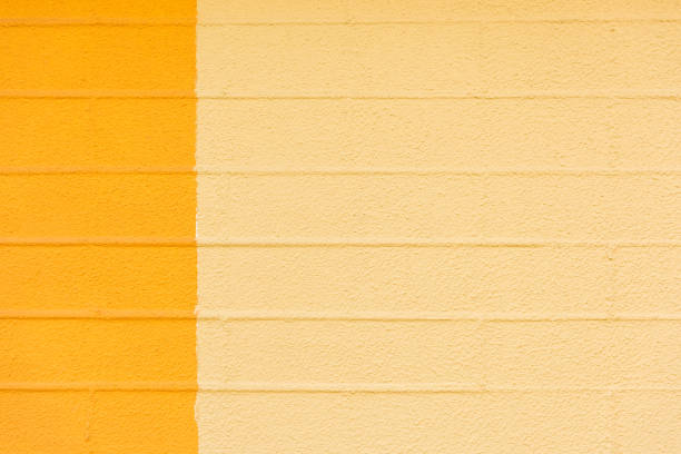 istock close-up view of empty yellow and beige textured background 974786170