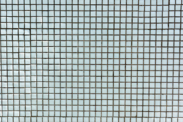 istock full frame view of light blue tiles background 974789092