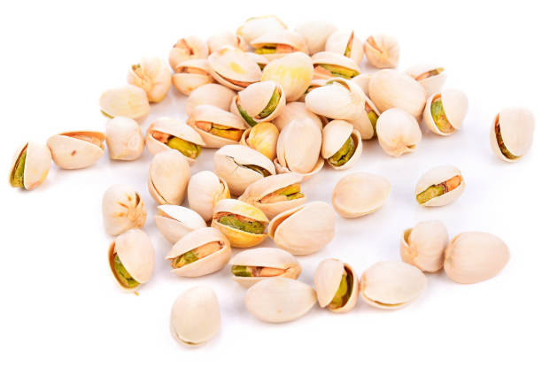 istock Pistachios isolated on white background 974798026