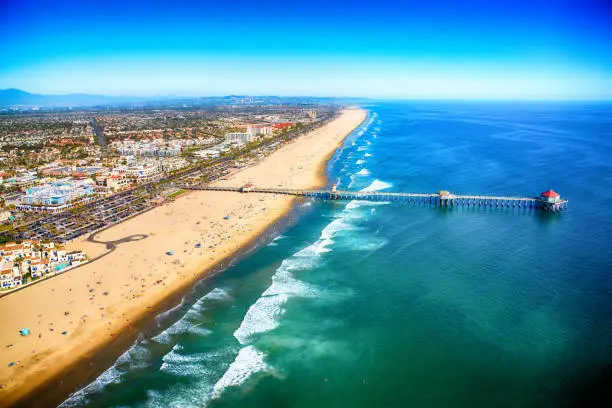 The northern Orange County California city of Huntington Beach shot from an altitude of about 2000 feet over the Pacific Ocean.