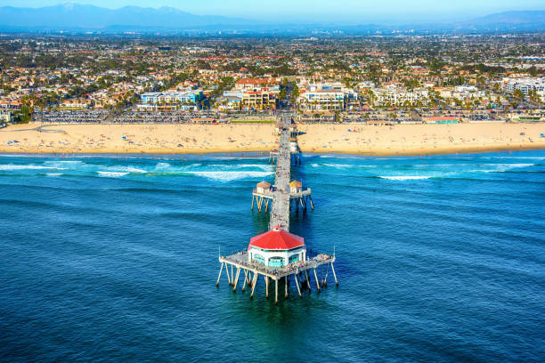 The northern Orange County California city of Huntington Beach shot from an altitude of about 600 feet over the Pacific Ocean.