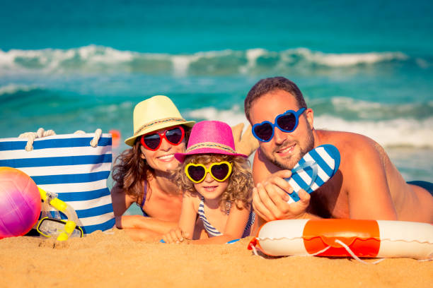 istock Family at the beach 974814960
