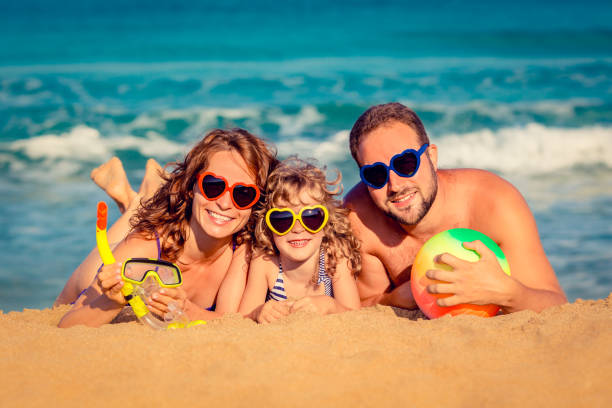 istock Family at the beach 974815450