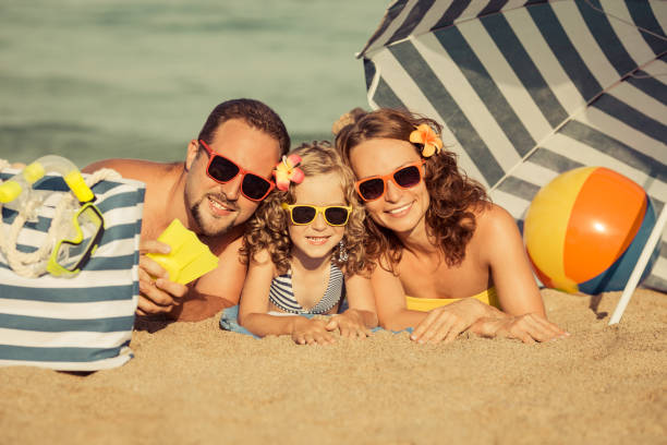istock Family on the beach 974815572