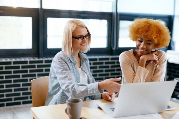 istock Business Women Working In Cafe 974820046