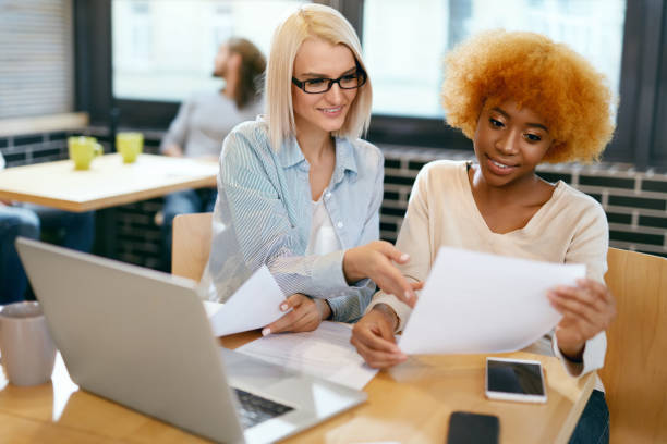istock Business Women Working In Cafe 974820182