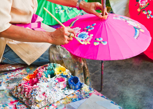 regenschirm malerei handgefertigt. - handmade umbrella stock-fotos und bilder