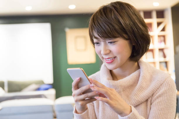 istock A woman relaxing at a cafe 974828648