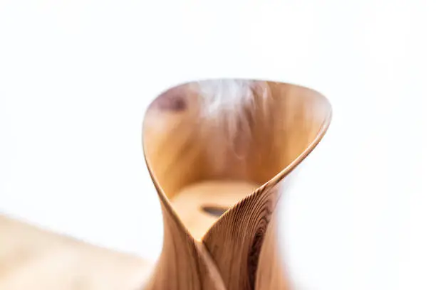 Wooden bamboo essential oil diffuser macro closeup showing detail and texture, with steam modern minimalistic minimal health vapor