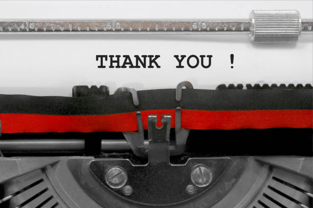 istock Thank You text by the old typewriter on white paper 974831410