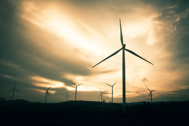 istock Wind turbine power generators on mountain 974834498