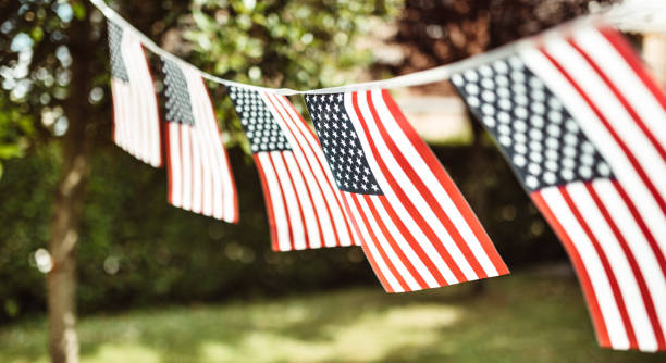 us pennant close up for the fourth of july celebration us pennant close up for the fourth of july celebration american flag bunting stock pictures, royalty-free photos & images