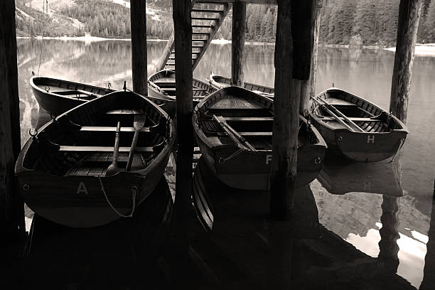 Sepia rowboats stock photo