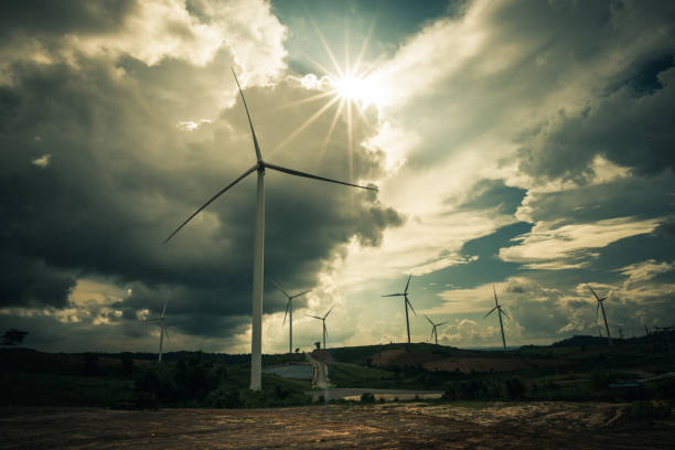 istock Wind turbine power generators on mountain 974852706
