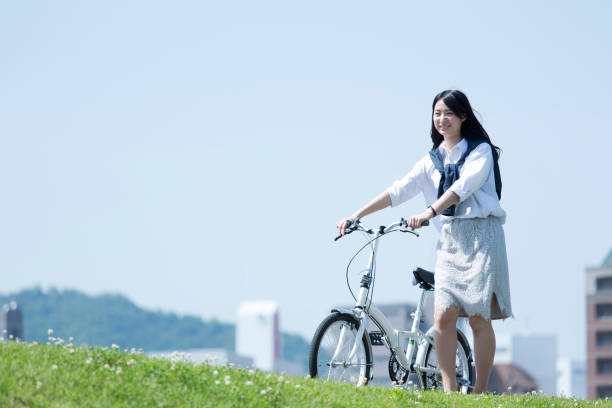 istock A woman riding a bicycle 974853466