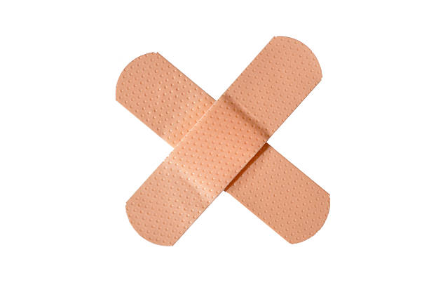 A close-up view of adhesive pads designed for treating and soothing heel blisters. The soft material offers cushioning, alleviates discomfort. Foot care product