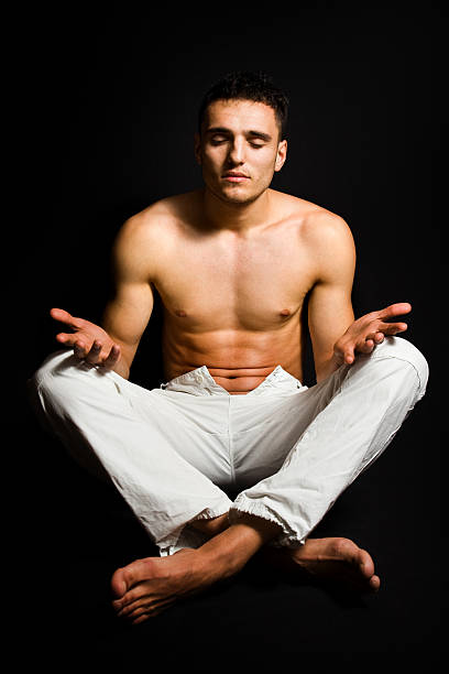 istock Young man in yoga position 97486721