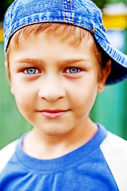 istock One cute kid with beautiful blue eyes 97487219