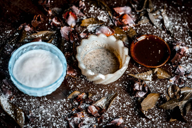 FACE PACK of neem leaves powder and crud or yoghurt for brighter and healthy skin. FACE PACK of neem leaves powder and crud or yoghurt for brighter and healthy skin. crud stock pictures, royalty-free photos & images