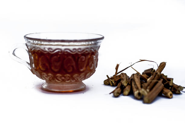 istock Ashwagandha roots and its powder also known as Indian ginseng, isolated on white essential beneficial for hair loss with its organic tea made from its powder. 974882726
