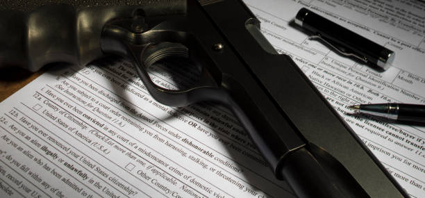istock NICS Background check for the purchase of a handgun 974884862