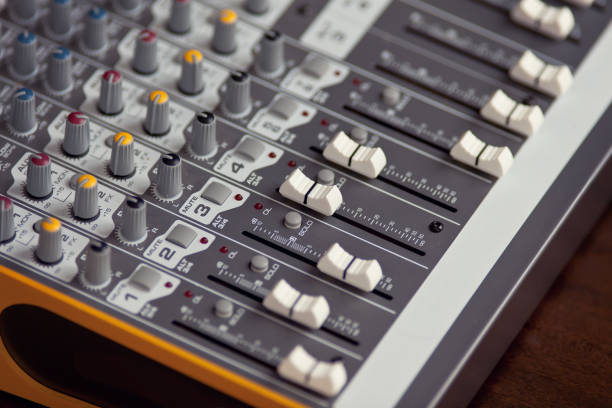 istock Audio studio sound mixing equalizer equipment board sliders and faders 974897006