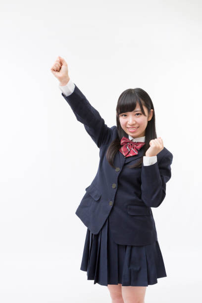 istock A girl student in uniform 974898870