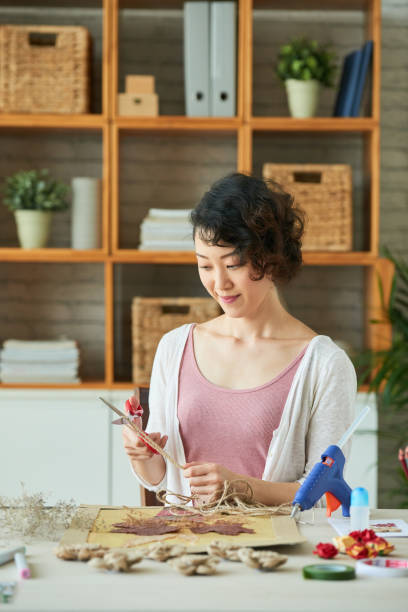 istock Japanese Designer Wrapped up in Work 974902118