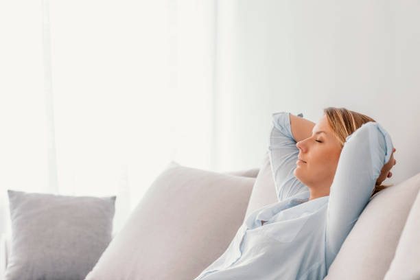 istock Woman sleeping on vacations in an apartment 974912126