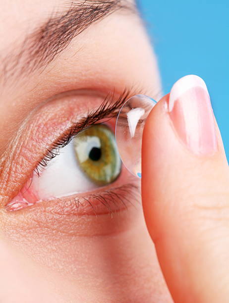 istock human eye with corrective lens on a blue 97492664
